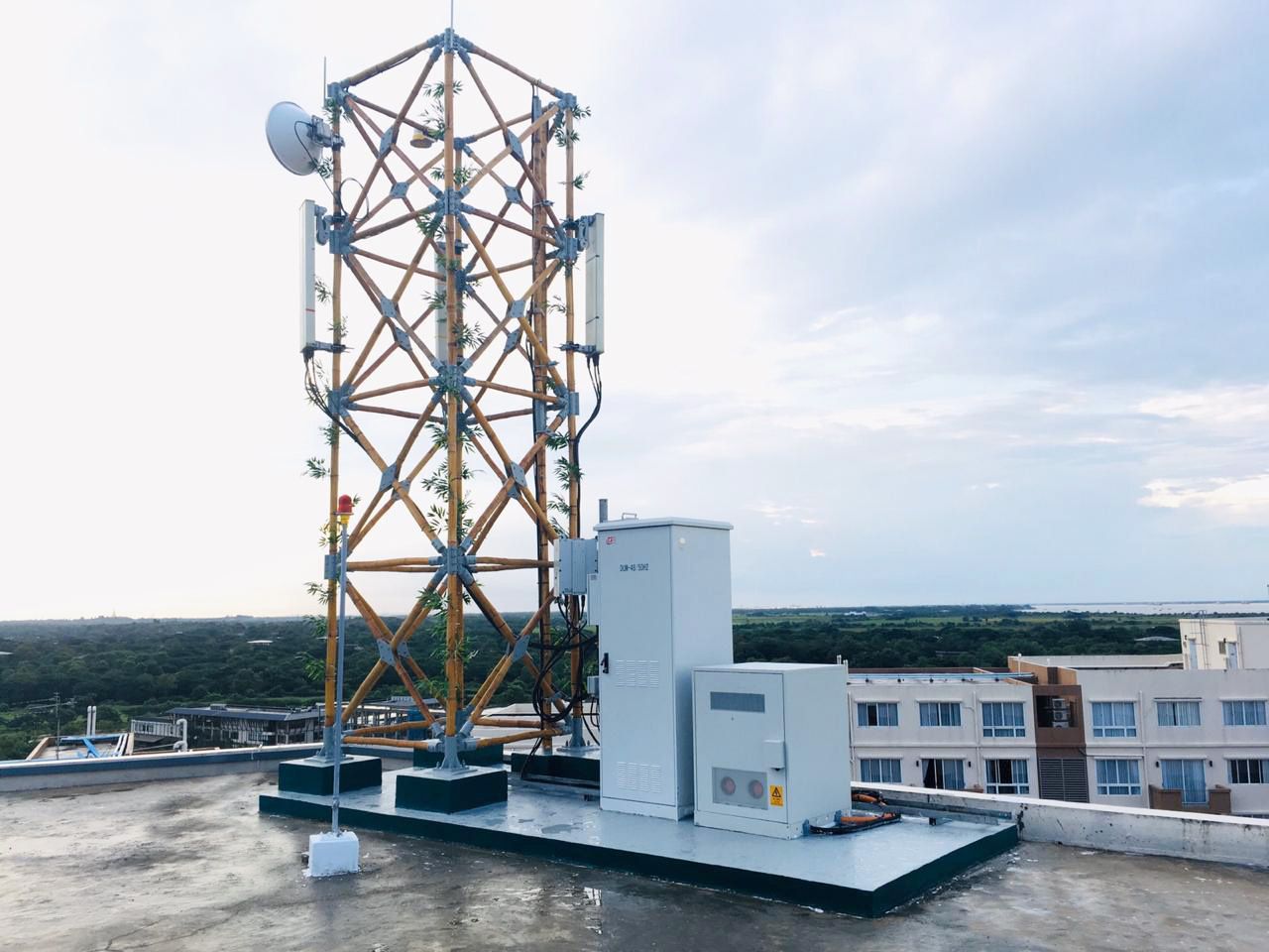 edotco unveils Myanmar’s first bamboo telecom tower.jpg